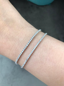 Shop classic diamond bracelets in 18 carat white gold at Dira London.com