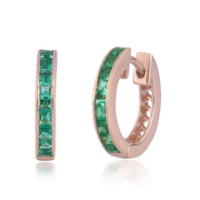 Load image into Gallery viewer, Shop channel-set emerald hoop earrings at DiraLondon.com
