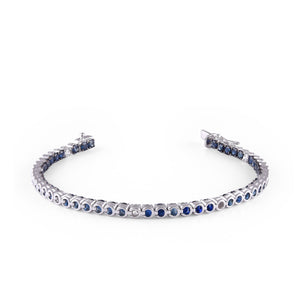 Shop blue sapphire and diamond bracelet at Dira London.com