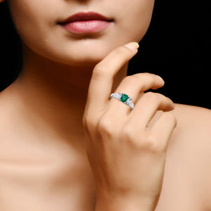 Emerald solitaire and diamond trinity ring