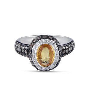 Yellow sapphire solitaire and diamond ring