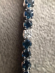 Shop blue sapphire and diamond bracelet at Dira London.com