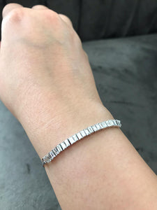 Shop baguette diamond adjustable bracelet in 18K gold at Dira London.com