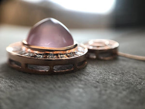 Rose quartz and diamond pendant in rose gold