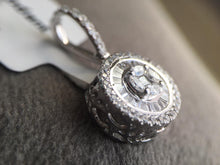 Load image into Gallery viewer, Shimmering round pendant with jacket and loop
